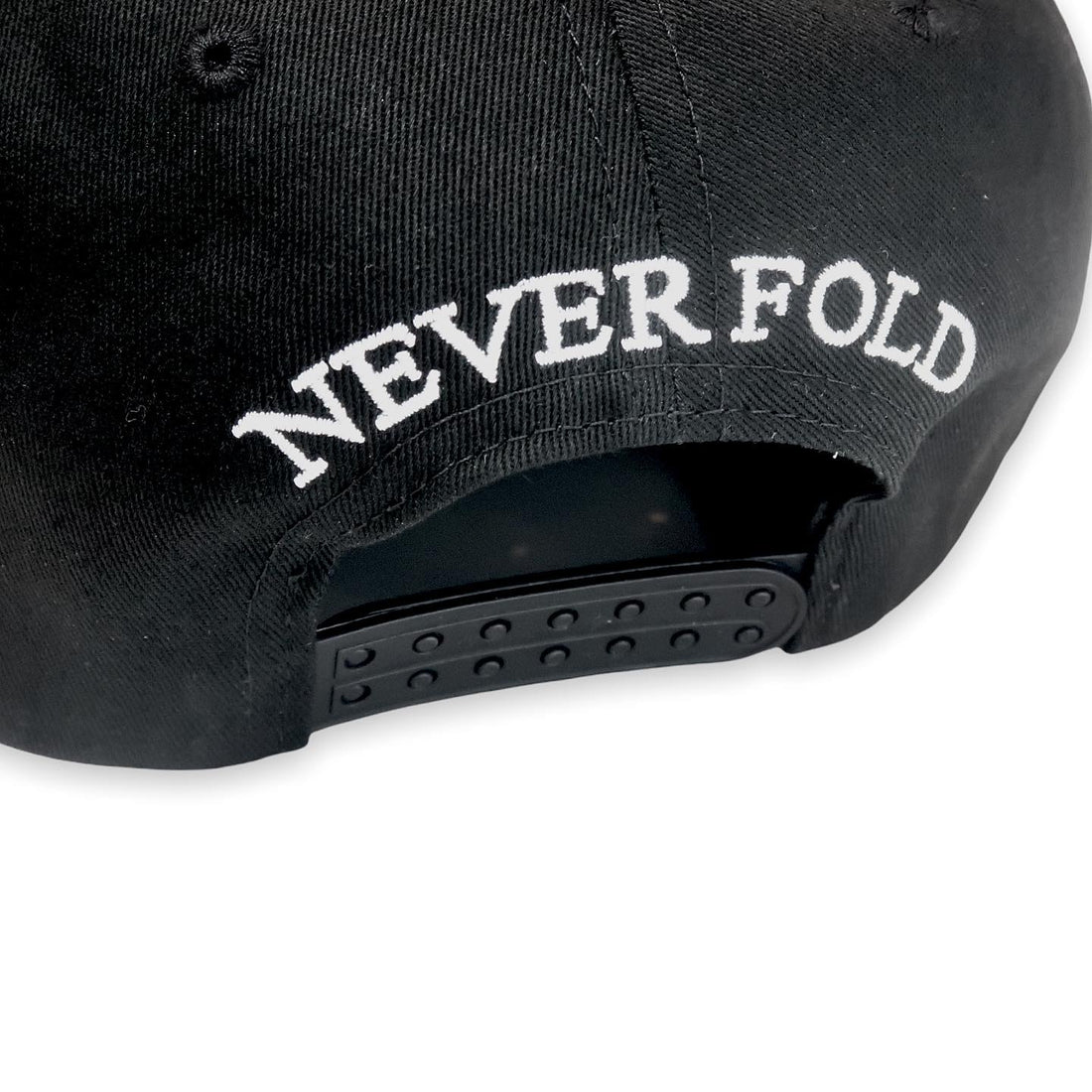 Never Fold On back of Black Cap