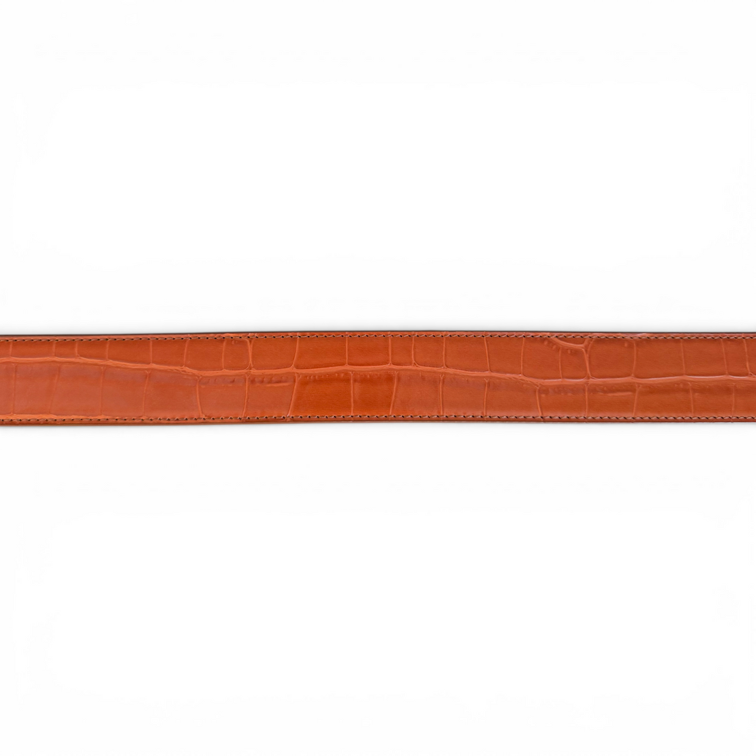 Orange leather belt with a crocodile pattern on a white background