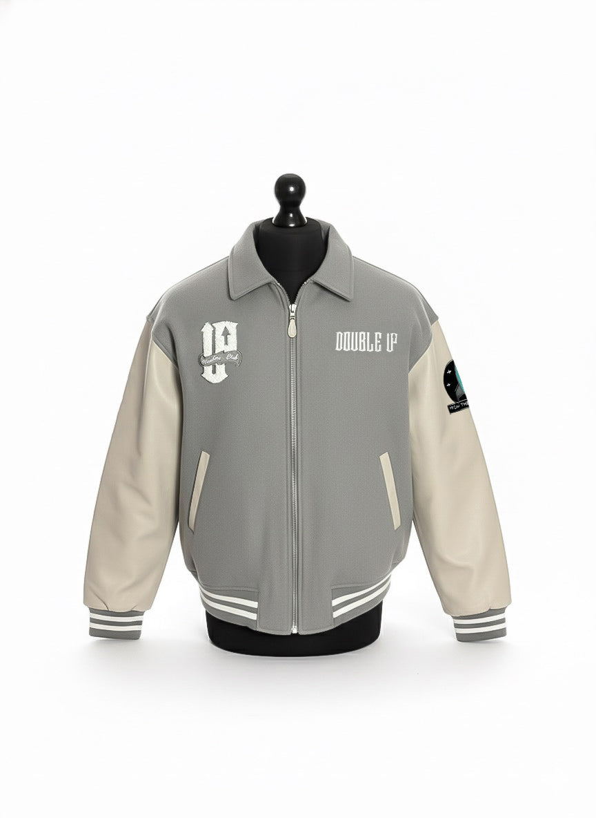 Front view of Double Up grey varsity jacket with zipper and pearl diamond quilted lining.